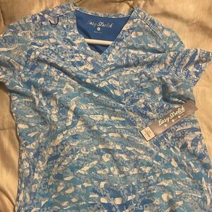 Women’s scrub top- new w tags- size medium